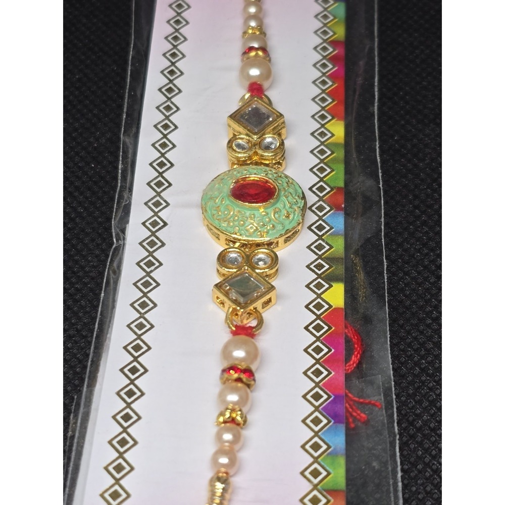Rakhi Multicolor Beaded Thread Bracelet w/ Red Oval Center, Dangle Charm, Tie